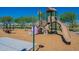 Community playground offering a variety of play structures, including swings and a slide for entertainment at 10251 W Gambit Trl, Peoria, AZ 85383