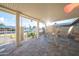 Covered patio with view of the low-maintenance yard, attractive patio furniture, and appealing design at 10326 W Kingswood Cir, Sun City, AZ 85351