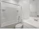 Clean bathroom with tiled shower-tub, stylish fixtures, and contemporary design at 11341 E Unger Ave, Mesa, AZ 85212