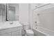 Functional bathroom featuring a combined tub and shower, efficient layout, and simple design at 11341 E Unger Ave, Mesa, AZ 85212
