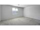 Neutral bedroom with plush carpet, lots of light, and a cozy feel at 11341 E Unger Ave, Mesa, AZ 85212
