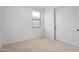 Bright bedroom featuring a double door closet and window, perfect for personalization and comfort at 11341 E Unger Ave, Mesa, AZ 85212