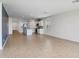 Bright living room with lots of room, tile floors and neutral color scheme at 11341 E Unger Ave, Mesa, AZ 85212