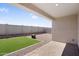 The spacious covered patio extends to the backyard and provides shade at 11341 E Unger Ave, Mesa, AZ 85212