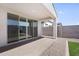 Covered patio featuring seamless indoor-outdoor living through sliding glass doors at 11341 E Unger Ave, Mesa, AZ 85212