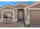 Charming single-story home featuring a covered entrance and desert landscaping at 1137 W 21St Ave, Apache Junction, AZ 85120