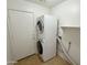 Convenient laundry room with stacked washer and dryer at 1137 W 21St Ave, Apache Junction, AZ 85120