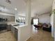 Open concept living area featuring tile flooring, neutral paint and an open layout at 1137 W 21St Ave, Apache Junction, AZ 85120