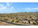 Beautiful suburban neighborhood featuring mountain views and tile roofed homes at 11413 S Coolwater Dr, Goodyear, AZ 85338