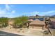 Beautiful home featuring a desert landscape, solar panels and a convenient two-car garage at 11413 S Coolwater Dr, Goodyear, AZ 85338