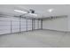 Spacious three car garage with multiple doors and ample room for storage at 11413 S Coolwater Dr, Goodyear, AZ 85338