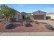 Charming single-story home with desert landscaping, solar panels and a two-car garage in a vibrant community at 12950 W Quinto Dr, Sun City West, AZ 85375