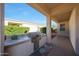 Outdoor grill area with a stainless steel grill, counter space, and a view of the backyard at 12950 W Quinto Dr, Sun City West, AZ 85375