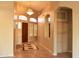 Bright entryway boasting a chandelier and tile flooring at 1490 W Laurel Ave, Gilbert, AZ 85233