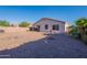Spacious backyard with desert landscaping, perfect for outdoor entertaining and relaxation at 1642 E Cardinal Dr, Casa Grande, AZ 85122