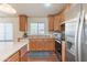 Bright kitchen with stainless steel appliances, tile backsplash, and ample counter space at 1642 E Cardinal Dr, Casa Grande, AZ 85122