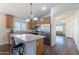 Functional kitchen with an island, stainless appliances and wood cabinetry at 1642 E Cardinal Dr, Casa Grande, AZ 85122