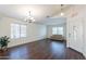 Inviting living room with dark flooring and large windows at 1642 E Cardinal Dr, Casa Grande, AZ 85122