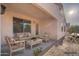 Covered patio offers a relaxing seating area and an inviting outdoor space at 1642 E Cardinal Dr, Casa Grande, AZ 85122