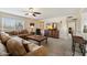 Cozy living room featuring comfortable seating, a ceiling fan, and a television at 17010 E Calle Del Oro -- # D, Fountain Hills, AZ 85268