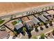 Aerial view of homes in a neighborhood, showing backyards and proximity to each other at 17043 N Avelino Dr, Maricopa, AZ 85138