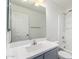 Bathroom featuring a vanity, large mirror, and a bathtub-shower combination at 1739 E Elegante Dr, Casa Grande, AZ 85122