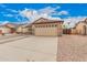 Charming single-story home featuring a two-car garage and low-maintenance desert landscaping at 1775 E Sycamore Rd, Casa Grande, AZ 85122