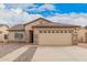 Charming single-story home featuring a two-car garage and low-maintenance desert landscaping at 1775 E Sycamore Rd, Casa Grande, AZ 85122
