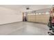 Spacious garage with a large garage door and ample room for parking and storage at 1775 E Sycamore Rd, Casa Grande, AZ 85122
