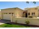 Charming single-story home featuring an attached garage, well-kept lawn, and inviting facade under a clear sky at 1839 E Vinedo Ln, Tempe, AZ 85284