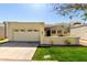 Charming single-story home featuring an attached garage, well-kept lawn, and inviting facade under a clear sky at 1839 E Vinedo Ln, Tempe, AZ 85284