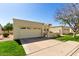 Spacious home with a two-car garage, and green lawn under a clear sky at 1839 E Vinedo Ln, Tempe, AZ 85284