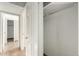 Hallway featuring a linen closet with a wire rack for storage at 1839 E Vinedo Ln, Tempe, AZ 85284