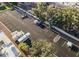 Aerial view of a parking lot with designated RV parking spaces and surrounding greenery at 1839 E Vinedo Ln, Tempe, AZ 85284