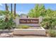 Villas las Palmas sign surrounded by green foliage at 1839 E Vinedo Ln, Tempe, AZ 85284