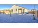 A backyard showcasing a desert landscape, covered patio, and a low-maintenance design at 20162 W Buchanan St, Buckeye, AZ 85326