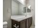 Bright bathroom featuring a modern vanity, large mirror, and a toilet at 20162 W Buchanan St, Buckeye, AZ 85326
