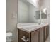 This bathroom has a dark vanity with a white countertop at 20162 W Buchanan St, Buckeye, AZ 85326