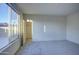 This carpeted bedroom offers ample natural light from a large window and a spacious closet at 20162 W Buchanan St, Buckeye, AZ 85326
