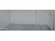 A bedroom with plush gray carpeting and a white door, ready for personalization at 20162 W Buchanan St, Buckeye, AZ 85326