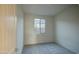 Cozy bedroom with carpet flooring, a window, and neutral paint at 20162 W Buchanan St, Buckeye, AZ 85326