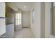 Bright foyer with tile flooring and natural light from a window at 20162 W Buchanan St, Buckeye, AZ 85326