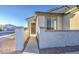 Inviting entrance with covered walkway and decorative landscaping at 20162 W Buchanan St, Buckeye, AZ 85326