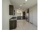 Spacious kitchen featuring stainless steel appliances, granite countertops, and a gas cooktop at 20162 W Buchanan St, Buckeye, AZ 85326