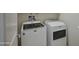 Laundry room with new matching, white Maytag washer and dryer units at 20162 W Buchanan St, Buckeye, AZ 85326