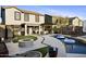 Wonderful backyard with pool, outdoor kitchen, fire pit, and beautiful landscaping at 21070 N Alexis Ave, Maricopa, AZ 85138