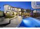Inviting backyard with a private pool, pergola-covered patio, and ample space for entertaining at 21070 N Alexis Ave, Maricopa, AZ 85138
