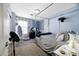 Bright bedroom with lots of natural light and simple decor. Includes bed and carpet at 21070 N Alexis Ave, Maricopa, AZ 85138