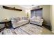 Comfortable living room with neutral-toned furnishings and a bright, airy feel at 21070 N Alexis Ave, Maricopa, AZ 85138