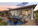 Inviting backyard with dining set and covered patio area at 22607 W Antelope Trl, Buckeye, AZ 85326